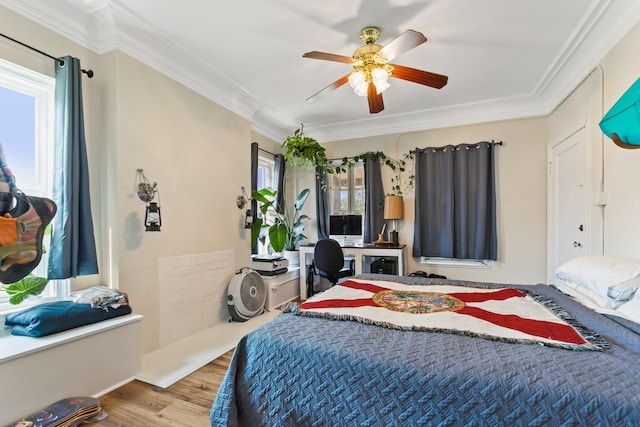 85 N Saint Augustine Blvd Unit 1, Saint Augustine, FL 32080 - bedroom featuring wood finished floors, ornamental molding, and a ceiling fan