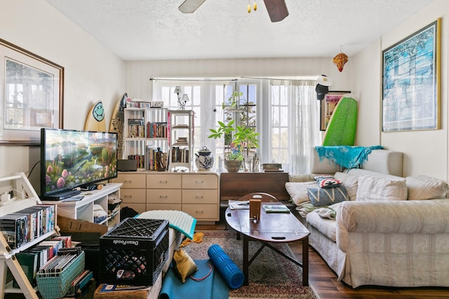 85 N Saint Augustine Blvd Unit 1, Saint Augustine, FL 32080 - living area featuring wood finished floors, a textured ceiling, and ceiling fan