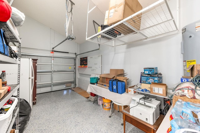 garage with white fridge and a garage door opener