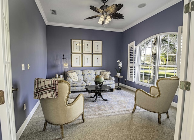 carpeted living area with baseboards, visible vents, and crown molding