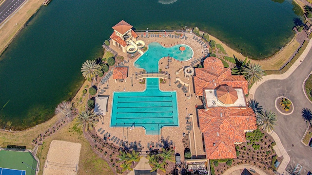 aerial view of a pool and a large body of water