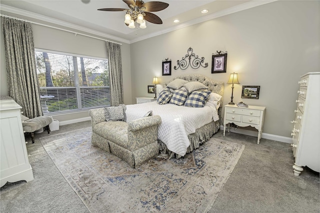 carpeted bedroom featuring a ceiling fan, baseboards, crown molding, and recessed lighting