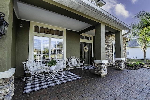 view of patio featuring a porch