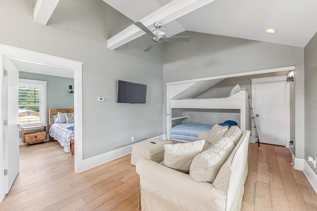 bedroom with beamed ceiling, high vaulted ceiling, light hardwood / wood-style flooring, and ceiling fan