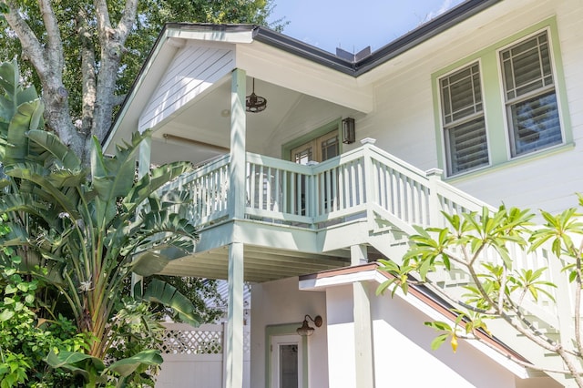 view of side of home with a balcony