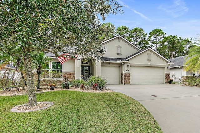view of front of property featuring a front yard, an attached garage, stucco siding, concrete driveway, and stone siding