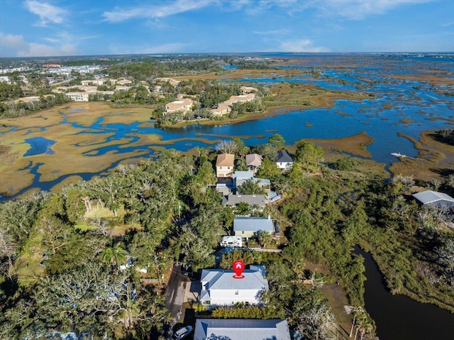 drone / aerial view with a water view