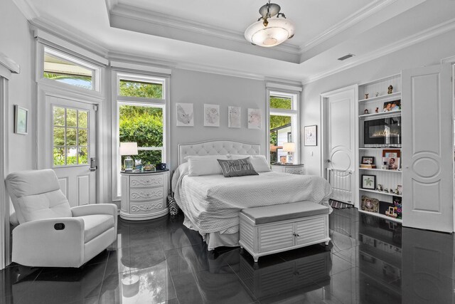 bathroom with a bathing tub, crown molding, and vanity