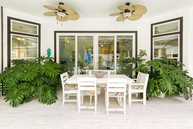 kitchen featuring kitchen peninsula, high vaulted ceiling, and a breakfast bar area