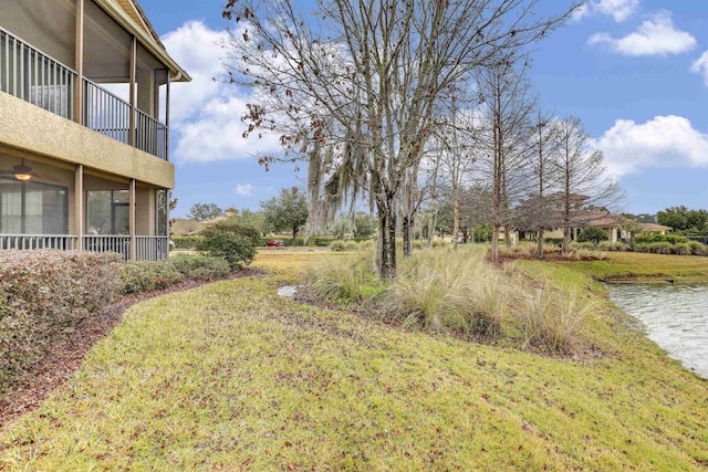 view of yard with a water view