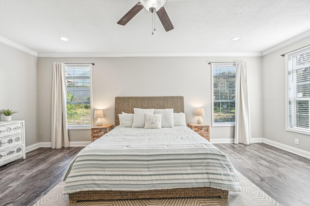 4954 A1A, Saint Augustine, FL 32080 - bedroom featuring multiple windows, ornamental molding, wood finished floors, recessed lighting, and a ceiling fan