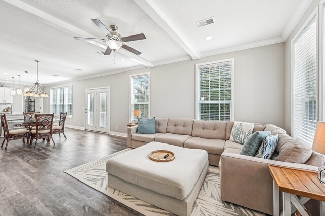 4954 A1A, Saint Augustine, FL 32080 - living room with wood finished floors, a ceiling fan, ornamental molding, recessed lighting, and beam ceiling