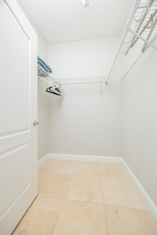 2 Lisbon St, Saint Augustine, FL 32080 - bedroom with ornamental molding, light wood finished floors, baseboards, and a ceiling fan