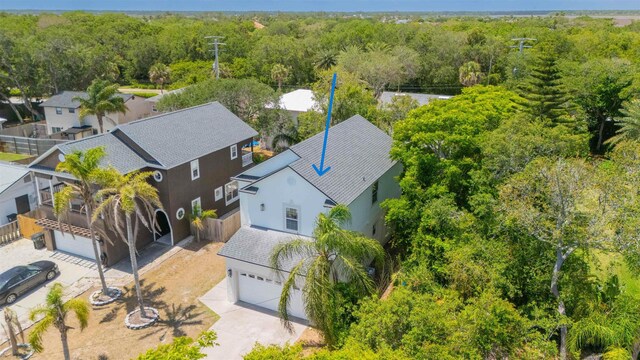 2 Lisbon St, Saint Augustine, FL 32080 - view of front of house with an attached garage, driveway, and stucco siding