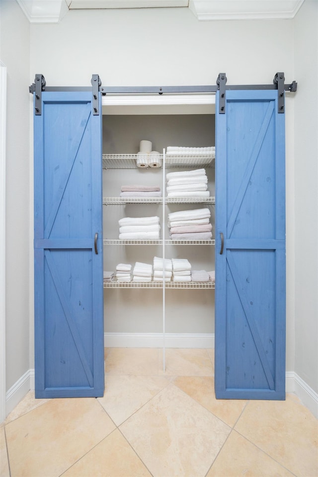2 Lisbon St, Saint Augustine, FL 32080 - detailed view of a barn door and baseboards