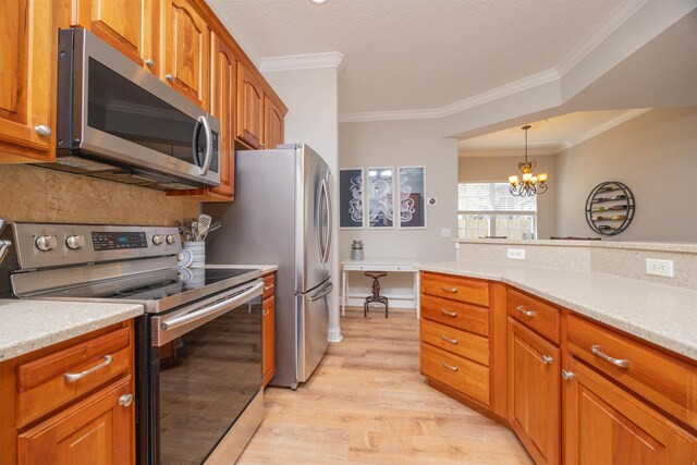 2 Lisbon St, Saint Augustine, FL 32080 - living area featuring light wood-type flooring, ornamental molding, recessed lighting, a chandelier, and a tray ceiling