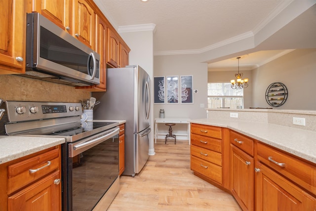 2 Lisbon St, Saint Augustine, FL 32080 - kitchen featuring stainless steel appliances, crown molding, light wood finished floors, brown cabinets, and light countertops