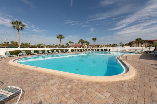 880 A1A Beach Blvd, Saint Augustine Beach, FL 32080 - community pool with a patio area and fence