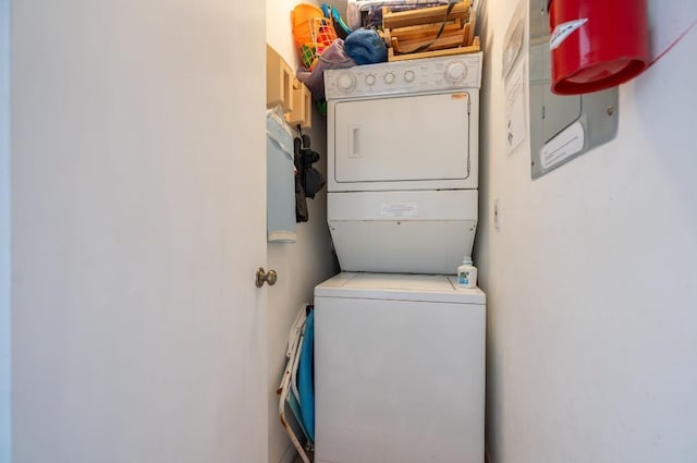 880 A1A Beach Blvd, Saint Augustine Beach, FL 32080 - washroom featuring stacked washer / drying machine and laundry area
