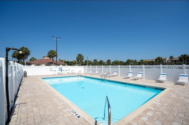 880 A1A Beach Blvd, Saint Augustine Beach, FL 32080 - pool featuring a patio and fence