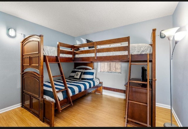 880 A1A Beach Blvd, Saint Augustine Beach, FL 32080 - bedroom featuring baseboards and light wood finished floors