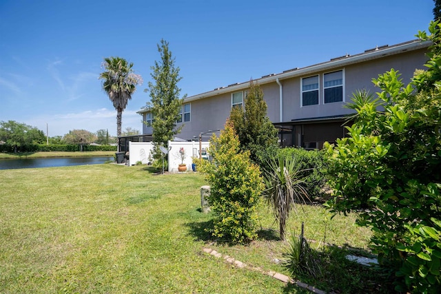 view of yard featuring a water view