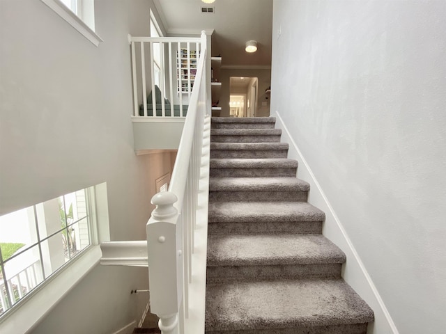 118 Sierras Loop, Saint Augustine, FL 32086 - staircase featuring ornamental molding