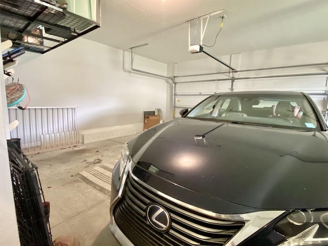 118 Sierras Loop, Saint Augustine, FL 32086 - garage featuring a garage door opener