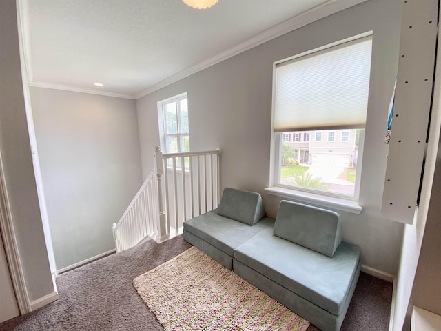 118 Sierras Loop, Saint Augustine, FL 32086 - living area with carpet floors, ornamental molding, and an upstairs landing