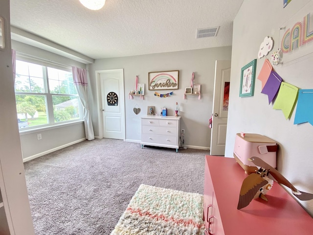 118 Sierras Loop, Saint Augustine, FL 32086 - bedroom featuring a textured ceiling and carpet