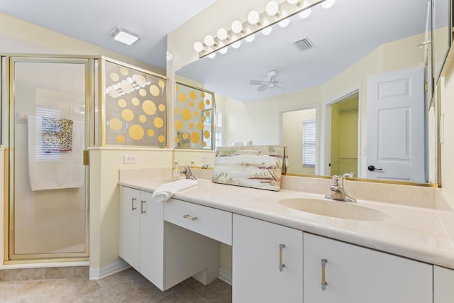 4 Eastgate Ln, Palm Coast, FL 32164 - full bath with a shower stall, a ceiling fan, double vanity, and tile patterned floors