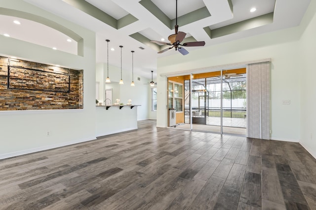 4 Eastgate Ln, Palm Coast, FL 32164 - unfurnished living room with a ceiling fan, dark wood-style floors, coffered ceiling, recessed lighting, and beam ceiling