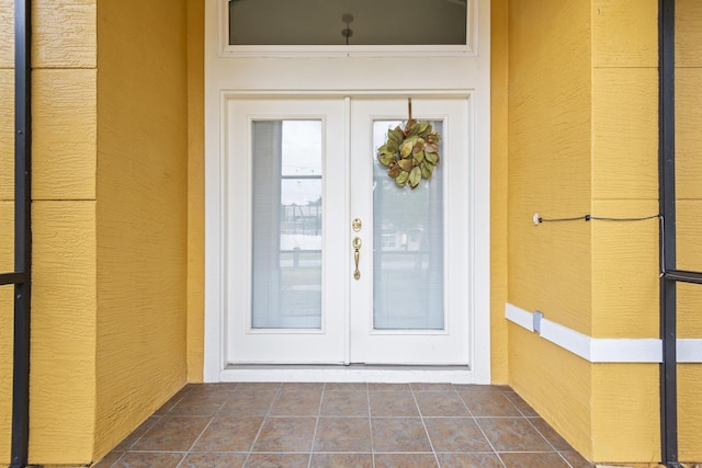 4 Eastgate Ln, Palm Coast, FL 32164 - view of exterior entry with french doors