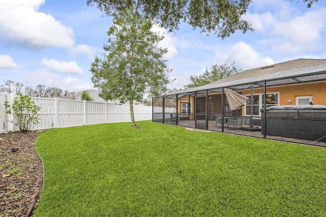 4 Eastgate Ln, Palm Coast, FL 32164 - fenced backyard with a hot tub, a patio, and a lanai