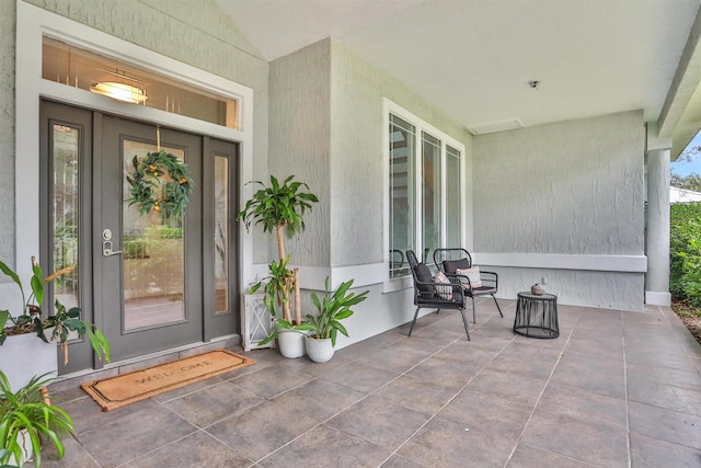 entrance to property with covered porch