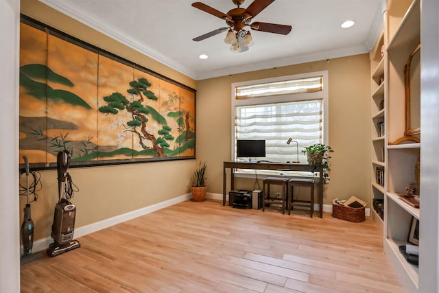 office area featuring light hardwood / wood-style flooring, ceiling fan, and ornamental molding