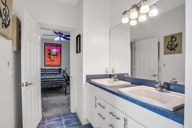 bathroom with tile patterned floors, ceiling fan, and vanity