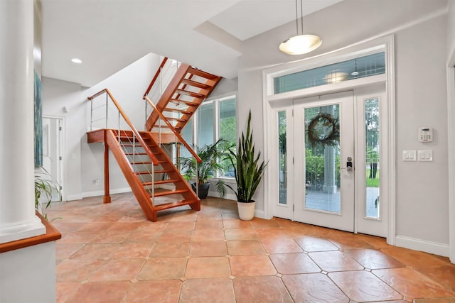 entryway featuring light tile patterned flooring