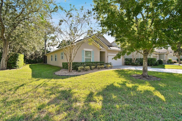 ranch-style home featuring a garage and a front lawn