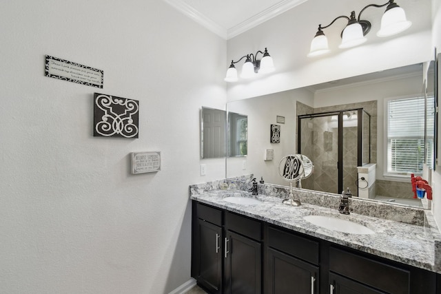 bathroom with vanity, ornamental molding, and walk in shower