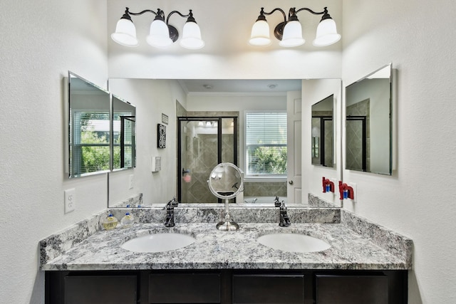 bathroom featuring crown molding, vanity, and independent shower and bath