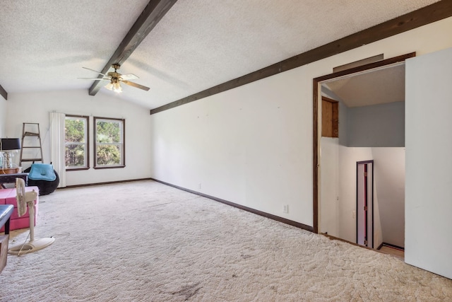 unfurnished living room featuring a textured ceiling, vaulted ceiling with beams, ceiling fan, and light carpet