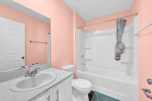 full bathroom featuring vanity, shower / bathtub combination, and toilet