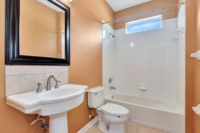 902 Heron Point Cir, Deland, FL 32724 - full bathroom with toilet, bathtub / shower combination, tile patterned flooring, backsplash, and a sink