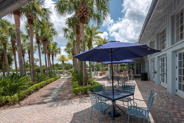 902 Heron Point Cir, Deland, FL 32724 - view of patio with outdoor dining space and french doors