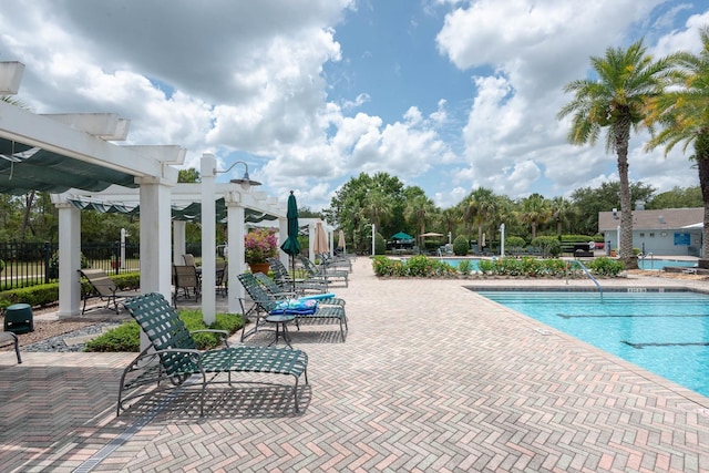 902 Heron Point Cir, Deland, FL 32724 - community pool with a pergola and a patio area
