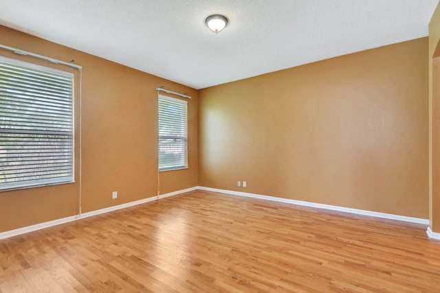 902 Heron Point Cir, Deland, FL 32724 - unfurnished room with light wood-style flooring and baseboards