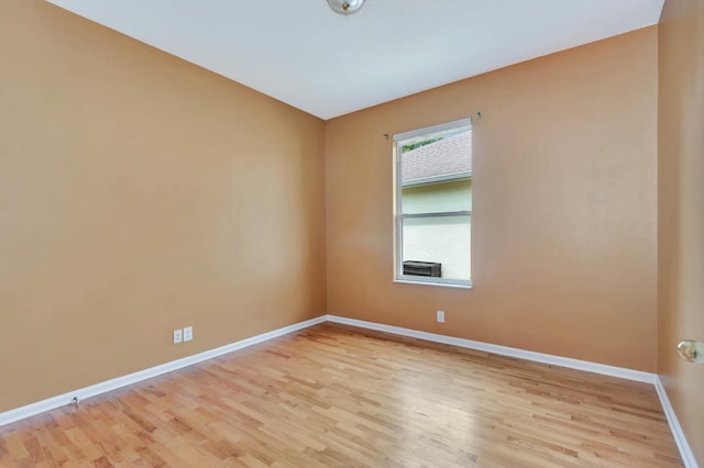 902 Heron Point Cir, Deland, FL 32724 - empty room with light wood finished floors and baseboards