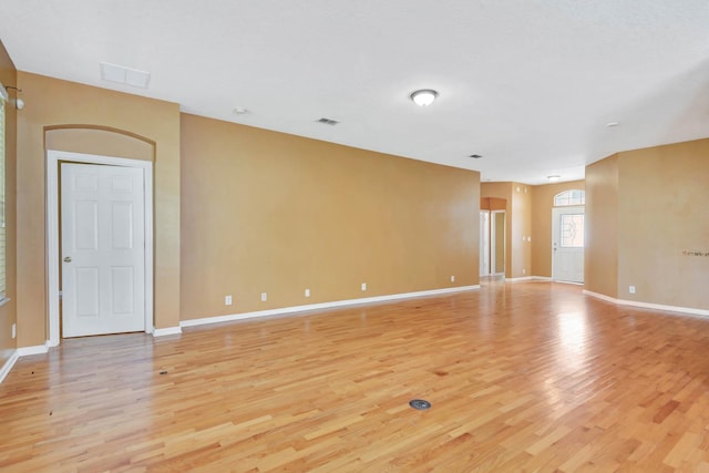 902 Heron Point Cir, Deland, FL 32724 - empty room with light wood-type flooring and baseboards