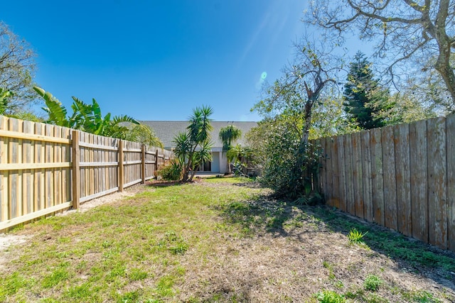 4602 Sandcastle Cir, Saint Augustine, FL 32084 - unfurnished bedroom featuring wood finished floors, a barn door, visible vents, connected bathroom, and baseboards